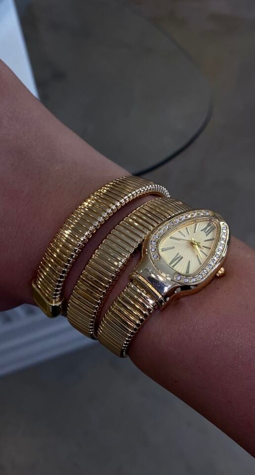 Yılan saat gold renk içi sarı