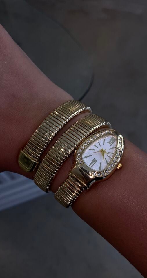 Yılan saat gold renk içi beyaz