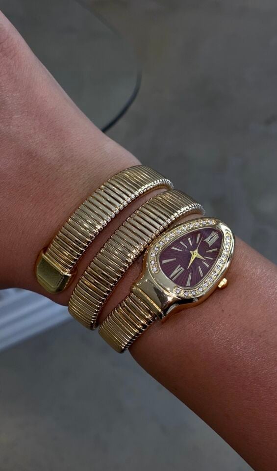 Yılan saat gold renk içi bordo