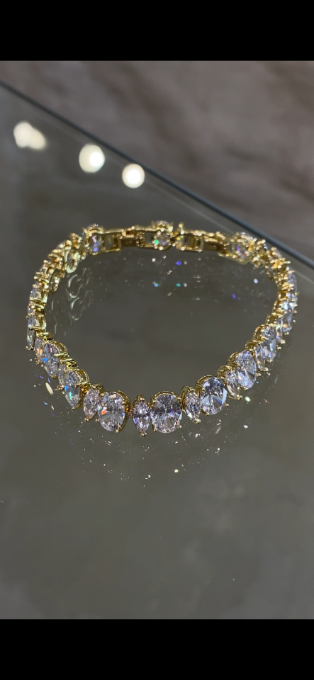 Oval kesim taşlı gold bileklik