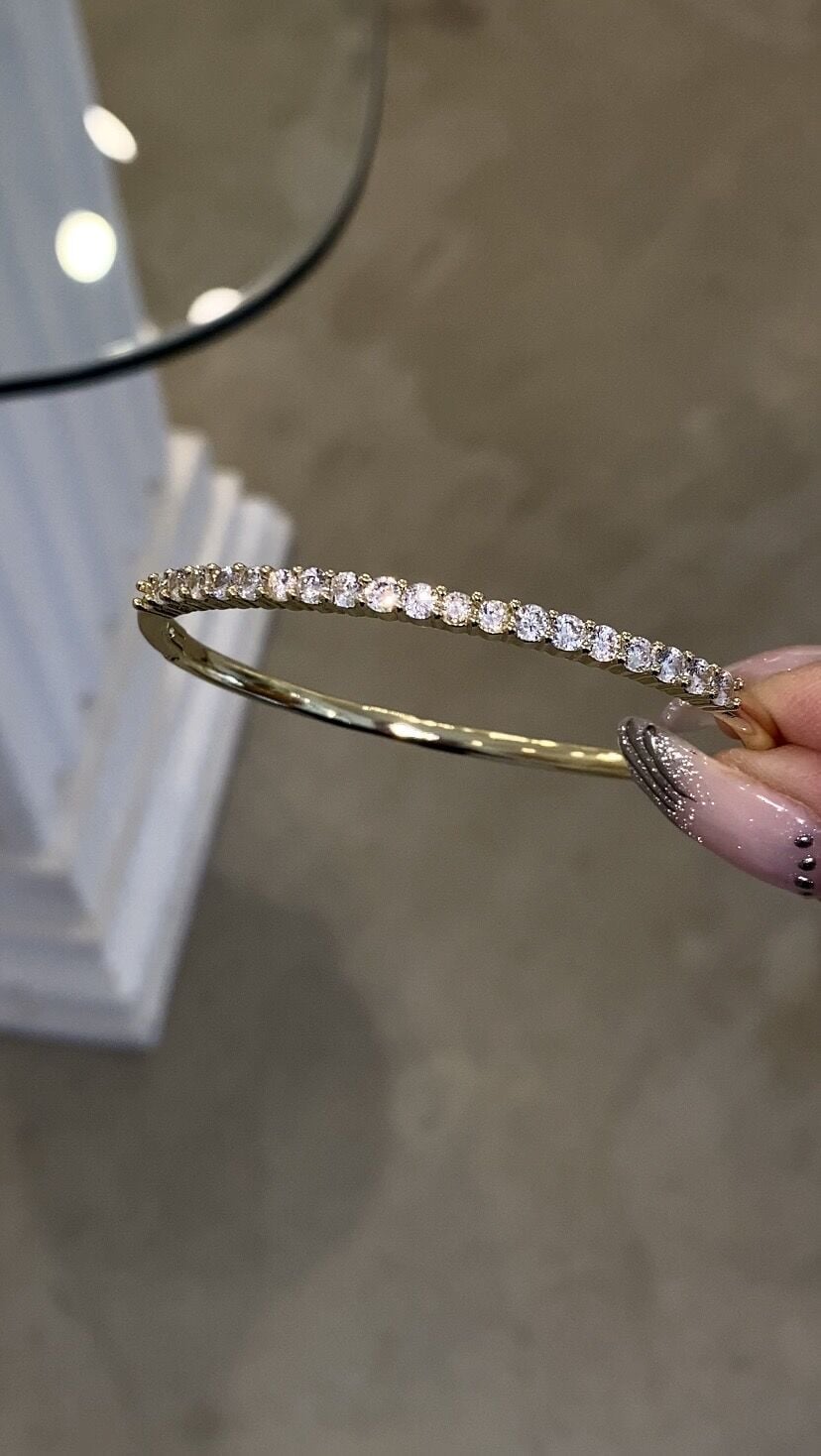 Suyolu taşlı kelepçe bileklik gold renk